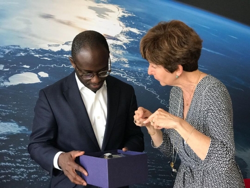 Magali Vaissiere, ESA’s Director of Telecommunications  and Integrated Applications, and the UK Science Minister  Sam Gyimah discussing a model of ESA's European Data Relay System at ECSAT
