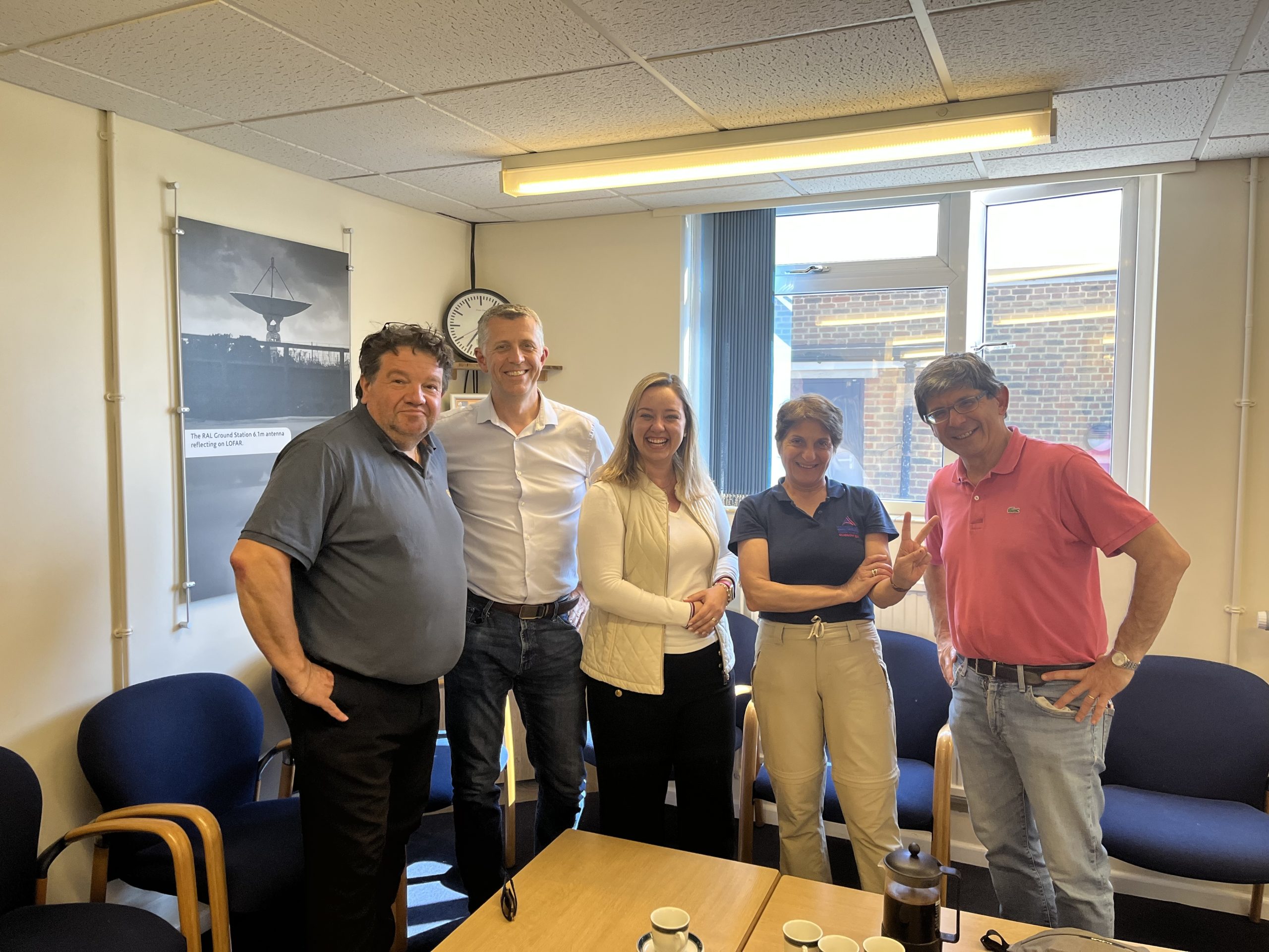 A group of people posing for a photograph